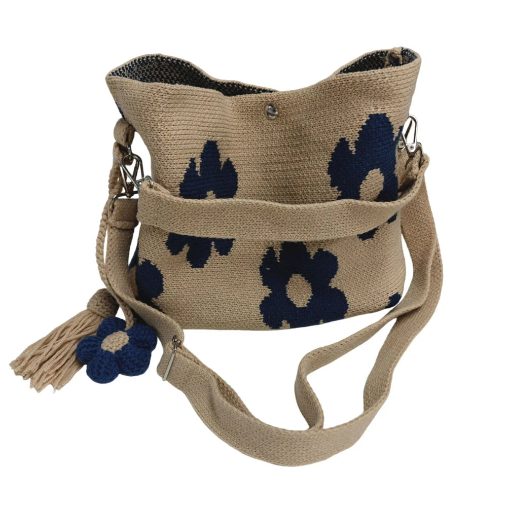 Yellow Bohemian crochet floral tote bag by Redemption By Ashley North with intricate floral patterns and woven handles.