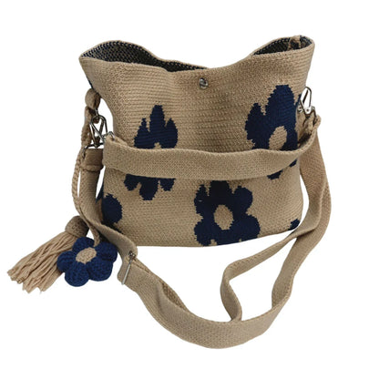 Yellow Bohemian crochet floral tote bag by Redemption By Ashley North with intricate floral patterns and woven handles.