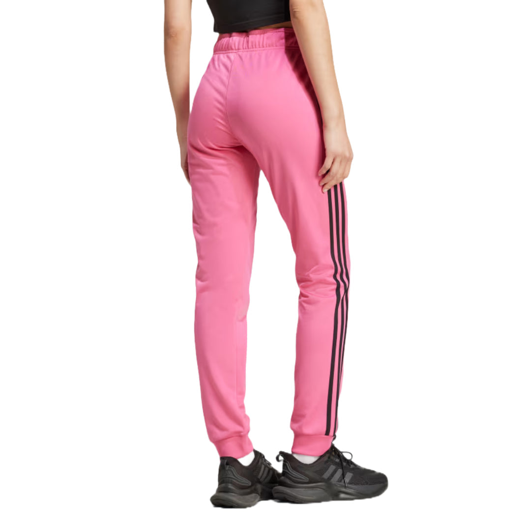 Runnwalk women's adidas Primegreen warm-up slim tapered track pants with 3 stripes in pulse magenta, shown in XS size.
