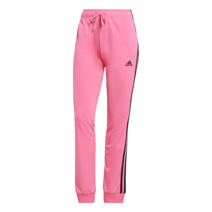 Runnwalk adidas women's Primegreen essentials warm-up slim tapered track pants in Pulse Magenta, featuring 3-stripes design.