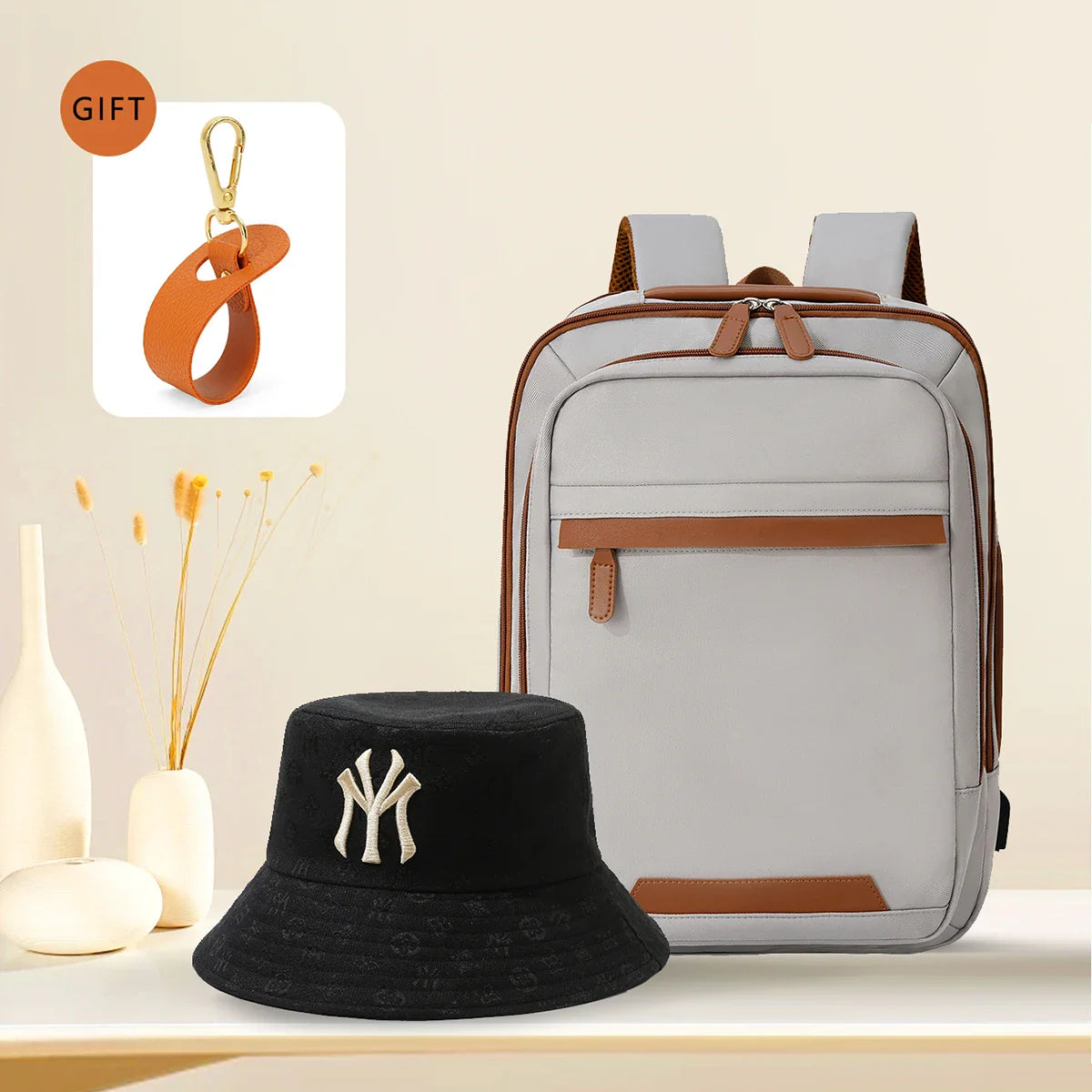 Waterproof USB rechargeable backpack for men and women showing large main compartment, laptop sleeve, and sturdy straps.