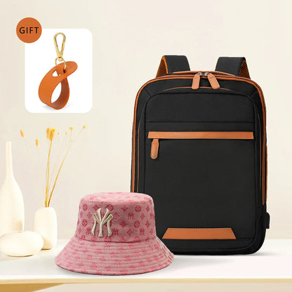 Black waterproof USB rechargeable backpack by Stone's Store, large unisex laptop bag suitable for school, work, or travel.