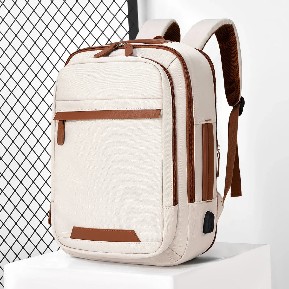 Black waterproof USB rechargeable backpack by Stone's Store, large laptop bag for men and women, ideal for school and travel.