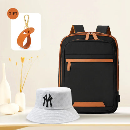 Black waterproof USB rechargeable backpack for men and women, large laptop carryall, unisex school and youth bag, from Stone's Store.