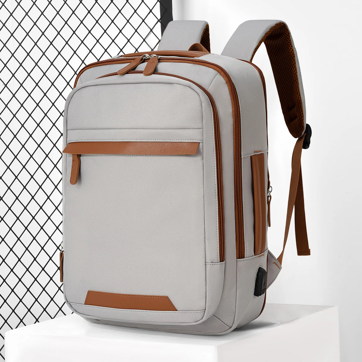 Black waterproof USB rechargeable backpack by Stone's Store, large unisex laptop backpack suitable for school and travel.