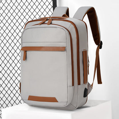 Black waterproof USB rechargeable backpack by Stone's Store, large unisex laptop backpack suitable for school and travel.