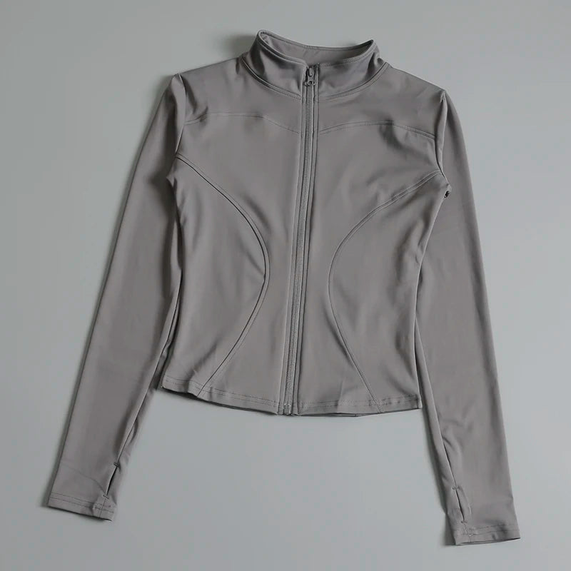 Women’s long sleeve zip fitness yoga shirt and sports jacket from Stone's Store, designed for gym, running, and activewear workouts.