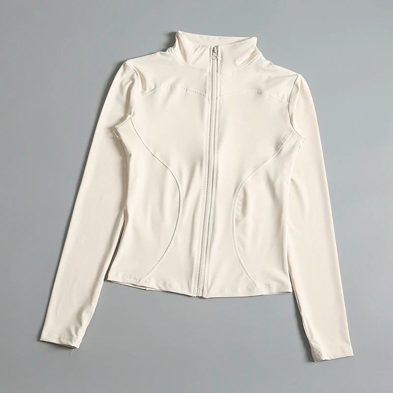 Women’s zip-up long sleeve fitness yoga shirt and sports jacket, breathable activewear for gym, running, and workout sessions.