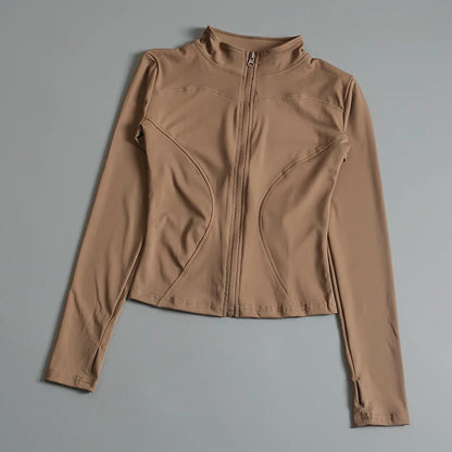 Women’s long sleeve zip fitness yoga shirt and sports jacket from Stone's Store, ideal for gym workouts and activewear.
