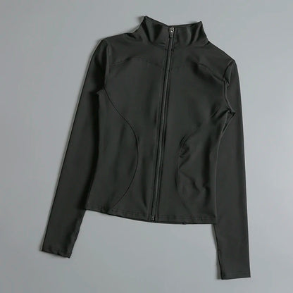 Women’s long sleeve zip fitness yoga shirt from Stone's Store, a sporty gym top with a fitted design and activewear style.
