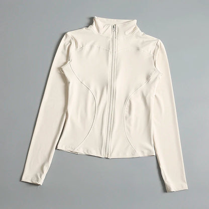 Women’s long sleeve zip fitness yoga shirt and sports jacket, made by Stone's Store, ideal for gym workouts and activewear.