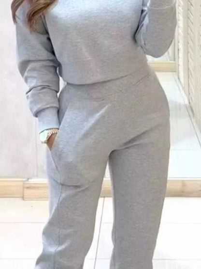 Trendsi casual chic cropped sweatshirt and matching jogger set, comfortable and stylish for everyday wear, shown in neutral color.