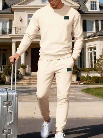 Plus size men's full-size round neck sweatshirt and jogger set in apricot, casual athletic wear by Trendsi