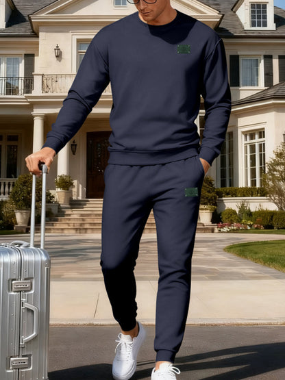 Plus size men's apricot full-zip round neck sweatshirt and jogger set by Trendsi, casual loungewear ensemble.