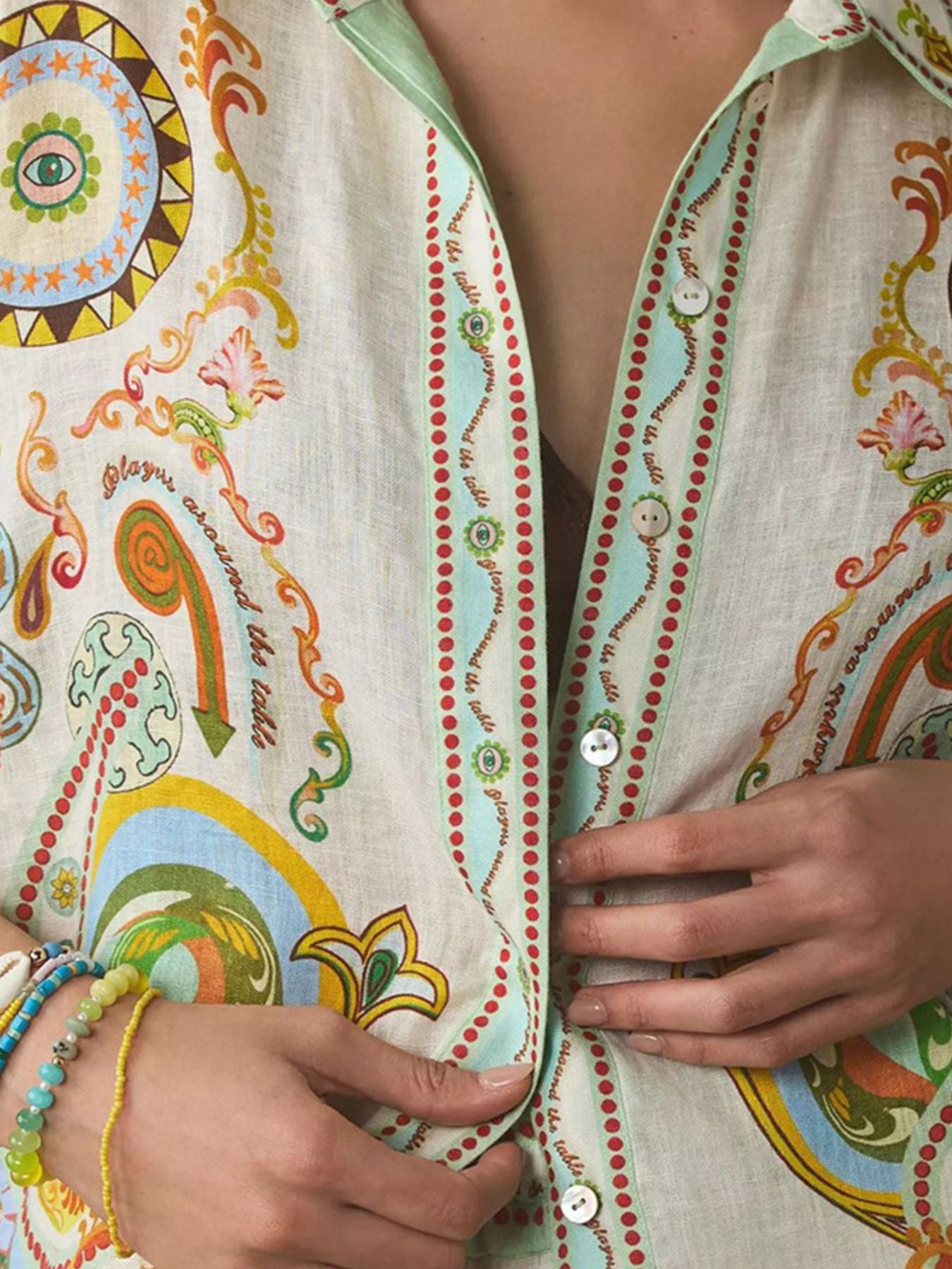 Printed button-up shirt and shorts set by Trendsi, featuring a stylish, colorful pattern and casual summer outfit.