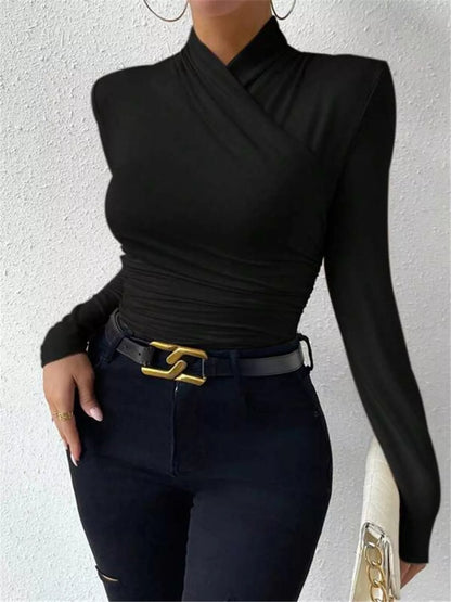 Ruched long sleeve slim fit top by Trendsi, shown in black with fitted design and gathered detailing on the sleeves.