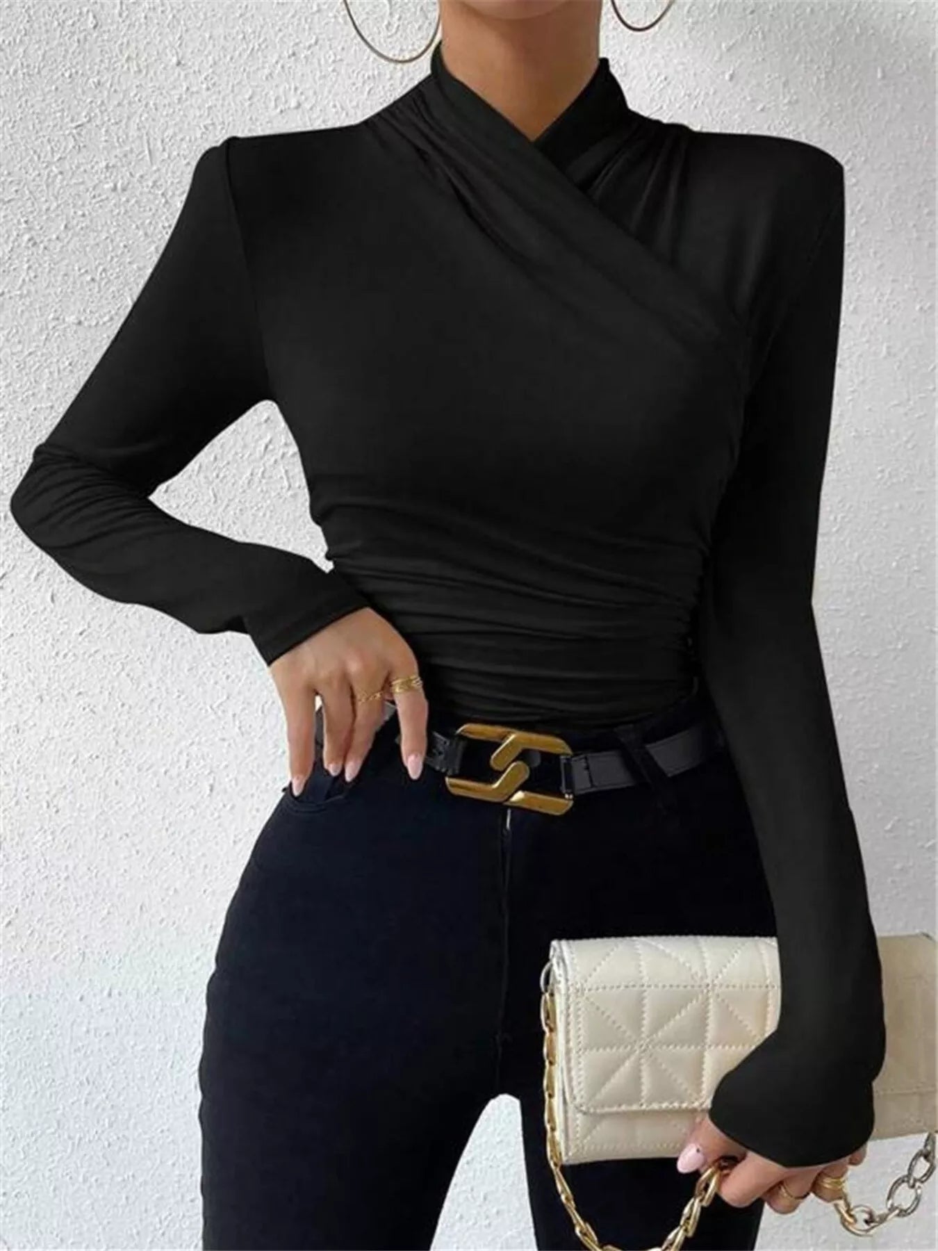 Trendsi ruched long sleeve slim fit top in a stylish design, shown in a close-up image highlighting the fabric and fit.
