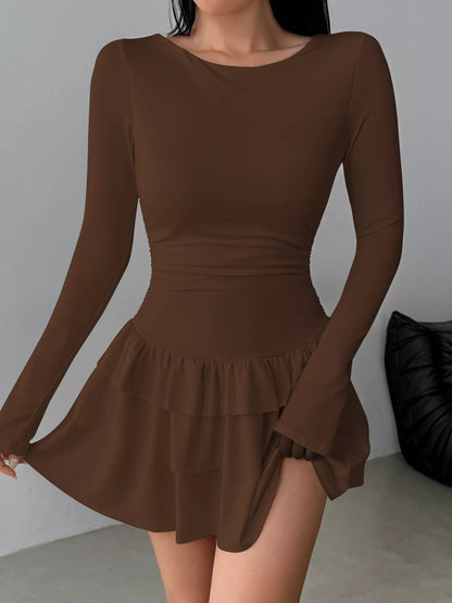Ruched long sleeve layered ruffle mini dress by Trendsi featuring a stylish design and feminine details, perfect for chic occasions.