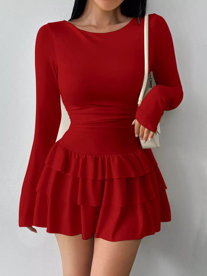 Ruched long sleeve layered ruffle mini dress from Trendsi featuring a stylish design and feminine ruffle details.