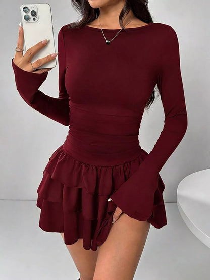Ruched long sleeve layered ruffle mini dress from Trendsi, featuring a stylish short dress with ruffle details and layered design.