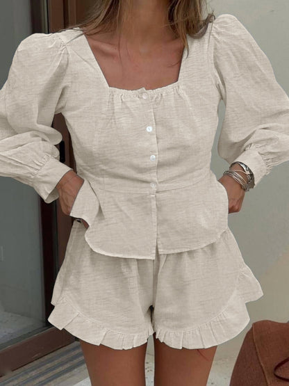 Beige button-front lantern sleeve top with matching shorts set by Trendsi, featuring a stylish, casual summer look.