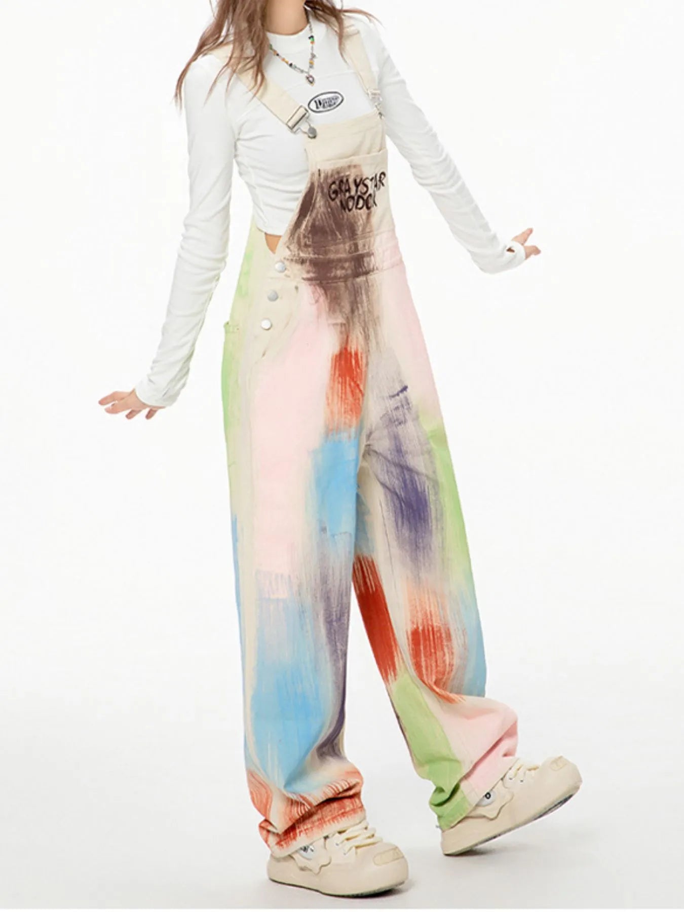 Beige colorful wide-leg overalls from Trendsi, featuring a relaxed fit, adjustable straps, and vibrant patchwork design.