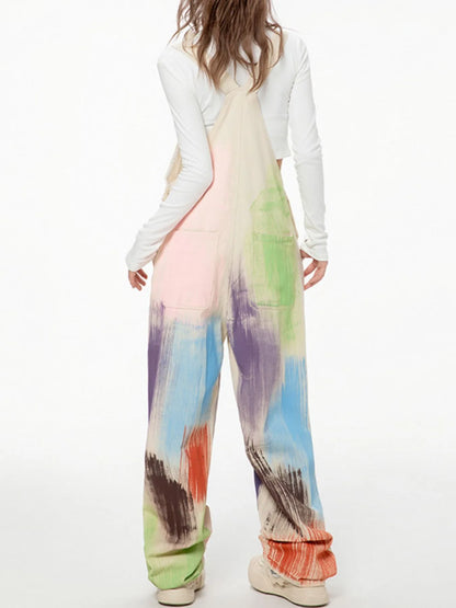 Colorful wide-leg overalls from Trendsi featuring beige fabric and vibrant, playful design with adjustable straps and large pockets.