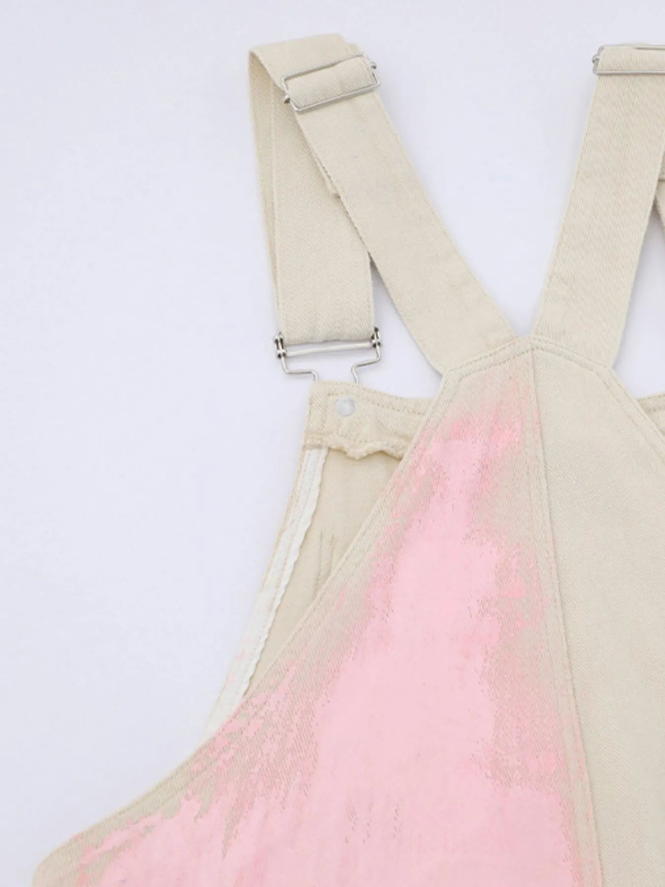 Colorful wide-leg overalls from Trendsi in beige with vibrant, multicolored patterns, featuring a relaxed fit and adjustable straps.