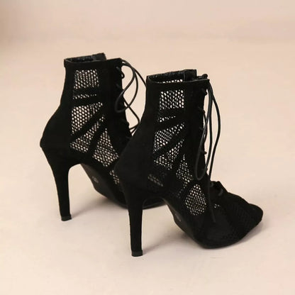 Black mesh lace-up sandals by Trendsi featuring open toe design and stylish ankle ties.