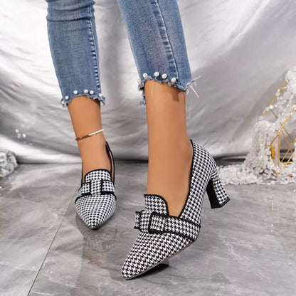 Black point toe block heel pumps from Trendsi, stylish women's shoes with a sleek design and comfortable heel height.
