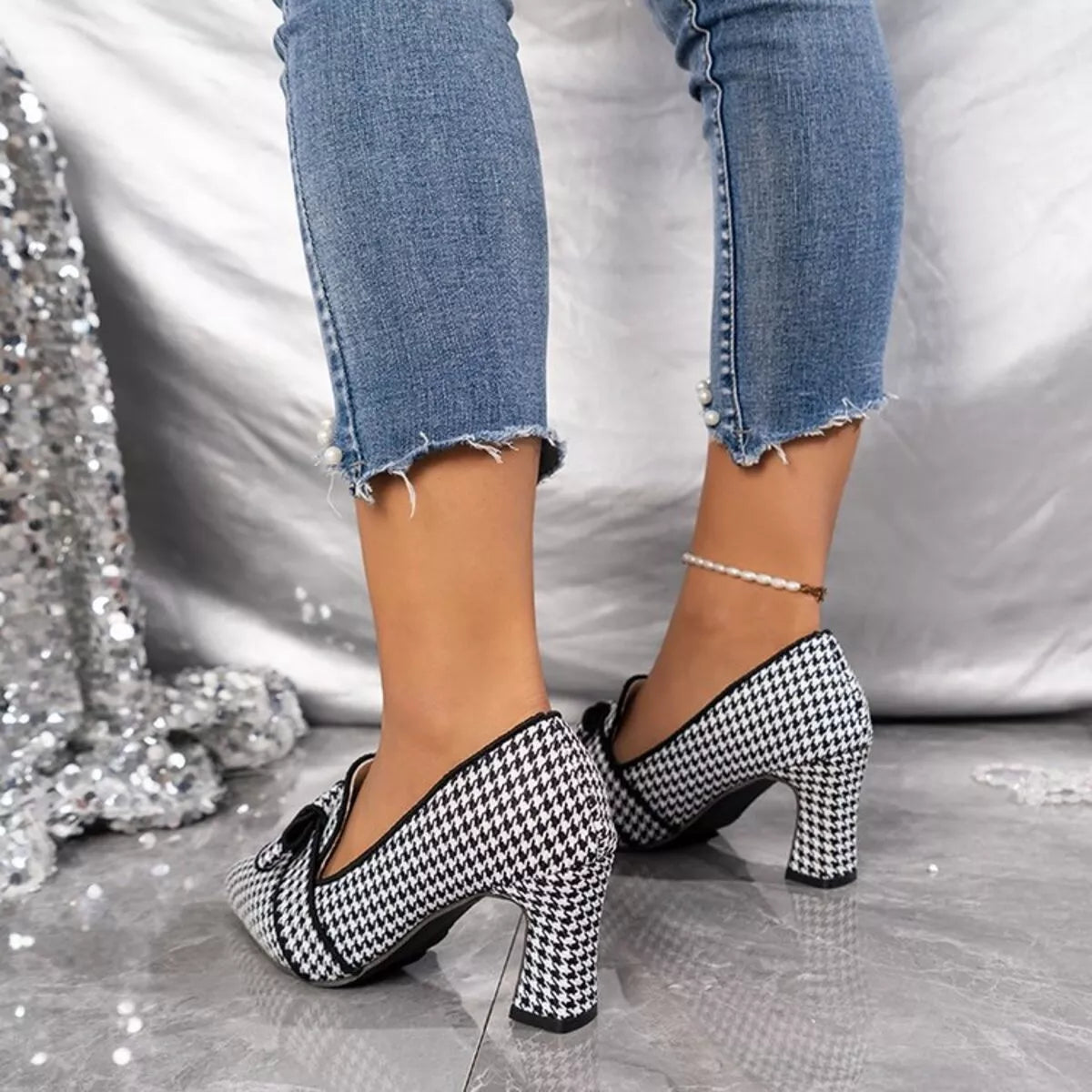 Black point toe block heels pumps by Trendsi, stylish and comfortable women's footwear with a sleek design and sturdy heel.