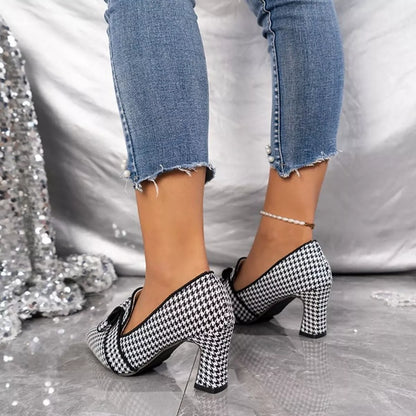 Black point toe block heels pumps by Trendsi, stylish and comfortable women's footwear with a sleek design and sturdy heel.