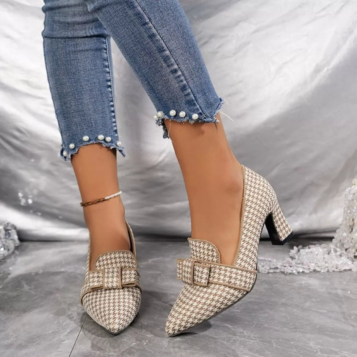 Black point toe block heels pumps by Trendsi, showing a stylish women's footwear design with sleek pointed toes and chunky heels.