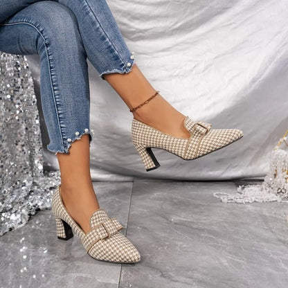 Black point toe block heel pumps from Trendsi, stylish women's footwear with a sleek design and comfortable block heel.