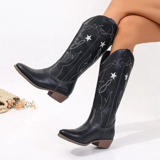 Black Western Star embroidered cowboy boots for women, featuring detailed stitching and classic Western style.