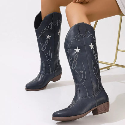 Black Western Star embroidered cowboy boots with intricate stitching and pointed toes, designed for Western style and comfort.