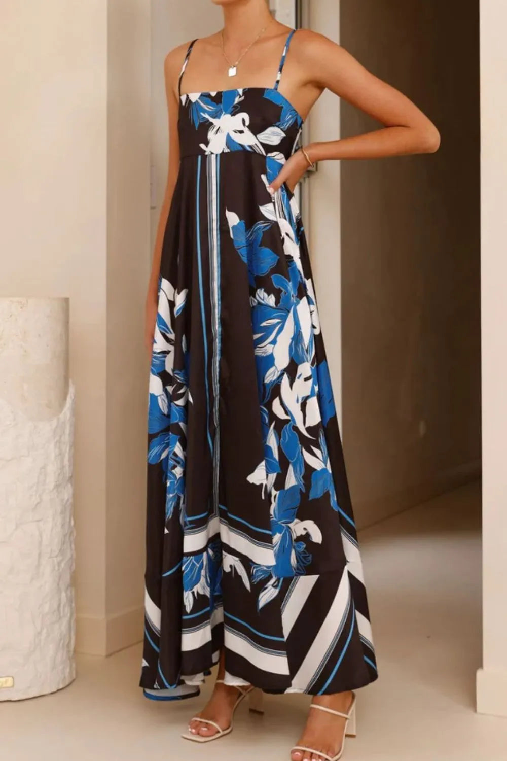 Printed square neck cami maxi dress by Trendsi featuring a flowy silhouette and vibrant floral pattern.