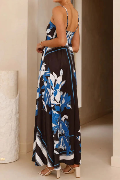 Printed square neck cami maxi dress by Trendsi, featuring a flowing design, square neckline, and vibrant print pattern.
