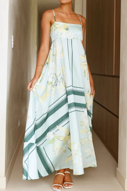Printed square neck cami maxi dress by Trendsi, featuring a flowy design, square neckline, and vibrant print fabric.