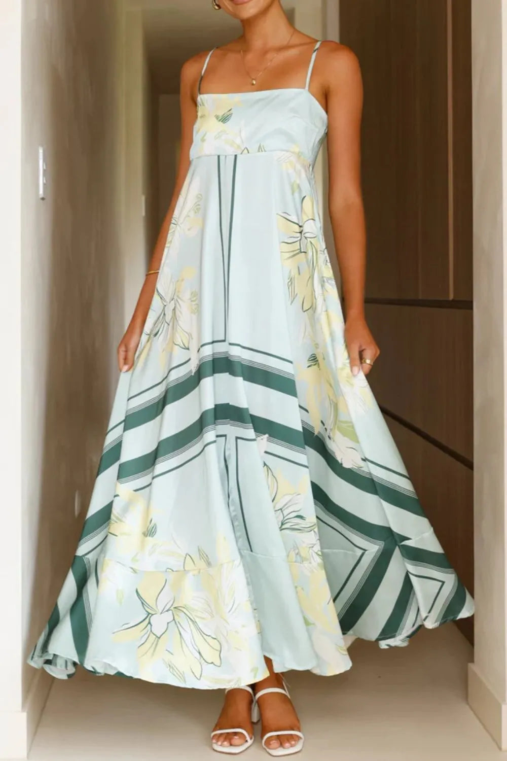 Printed square neck cami maxi dress from Trendsi featuring a flowy design and square neckline in a vibrant print.