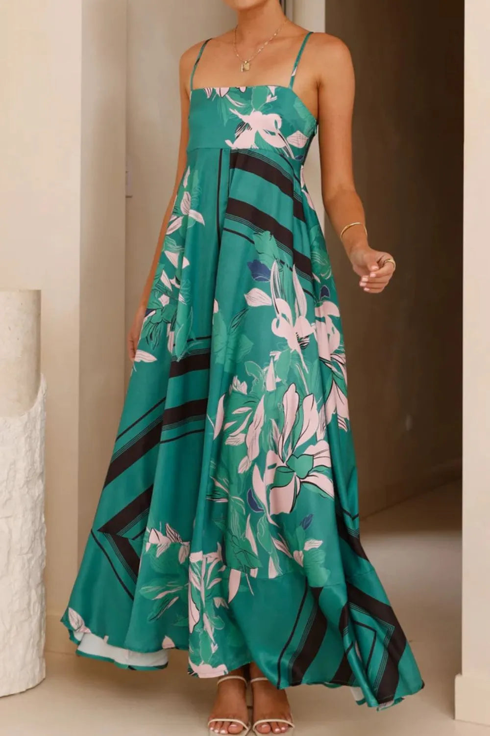 Printed square neck cami maxi dress by Trendsi featuring a flowy silhouette and vibrant floral pattern.