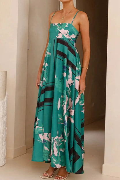Printed square neck cami maxi dress from Trendsi featuring a flowy silhouette and stylish square neckline.