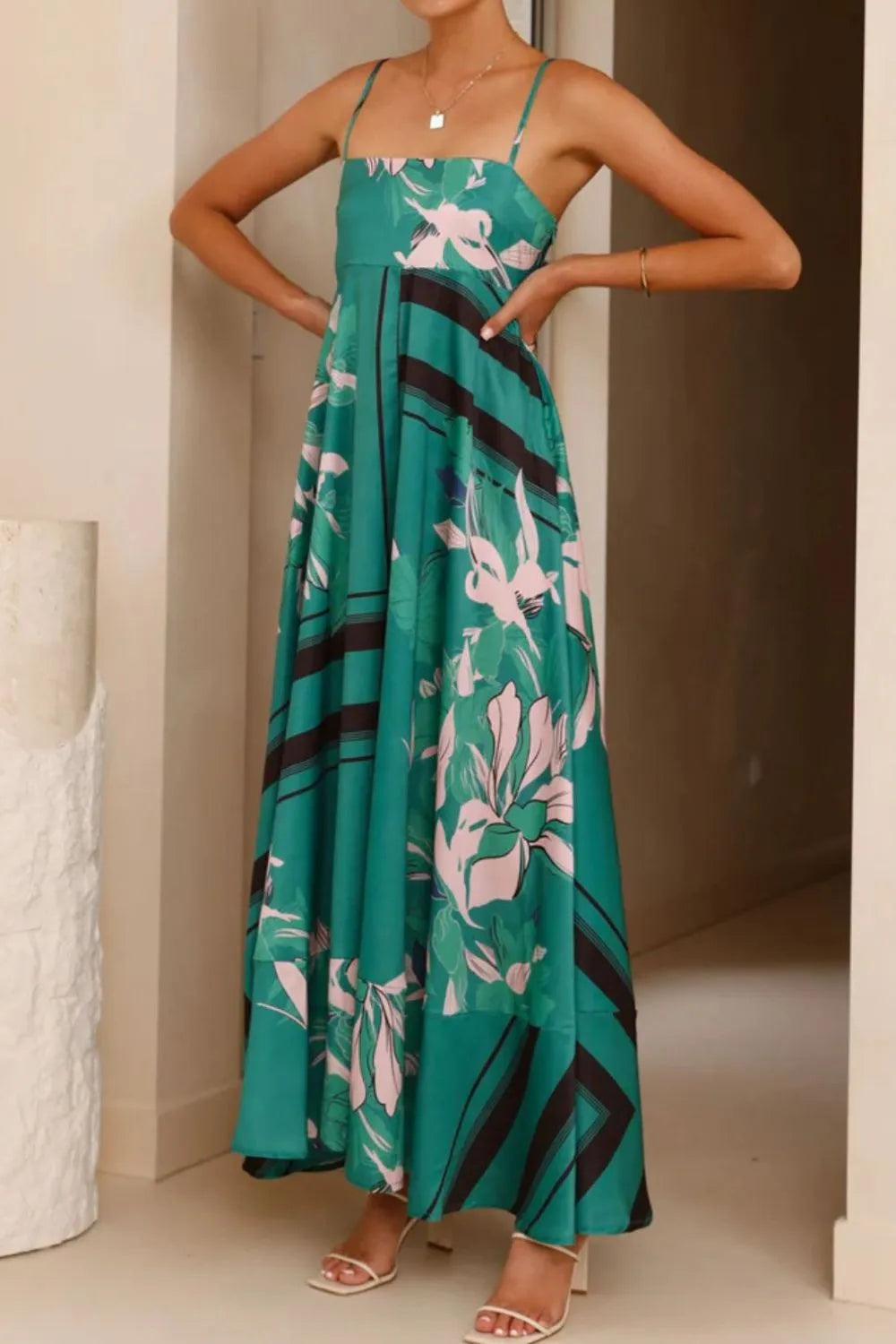Printed square neck cami maxi dress from Trendsi featuring a flowing silhouette, square neckline, and stylish print fabric.