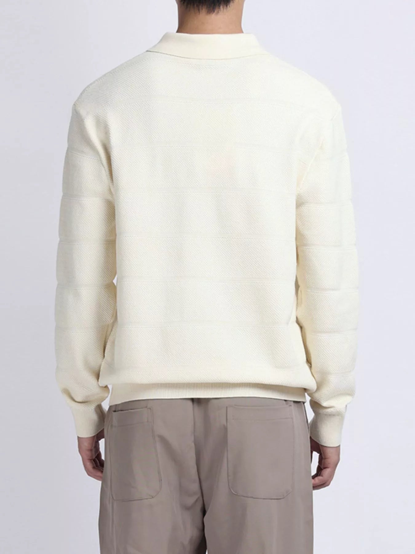 Plus size men's long sleeve knit top with button details in black, featuring a comfortable, stylish design.