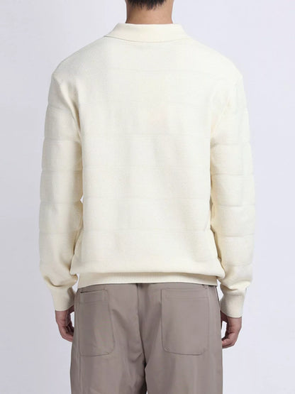 Plus size men's long sleeve knit top with button details in black, featuring a comfortable, stylish design.