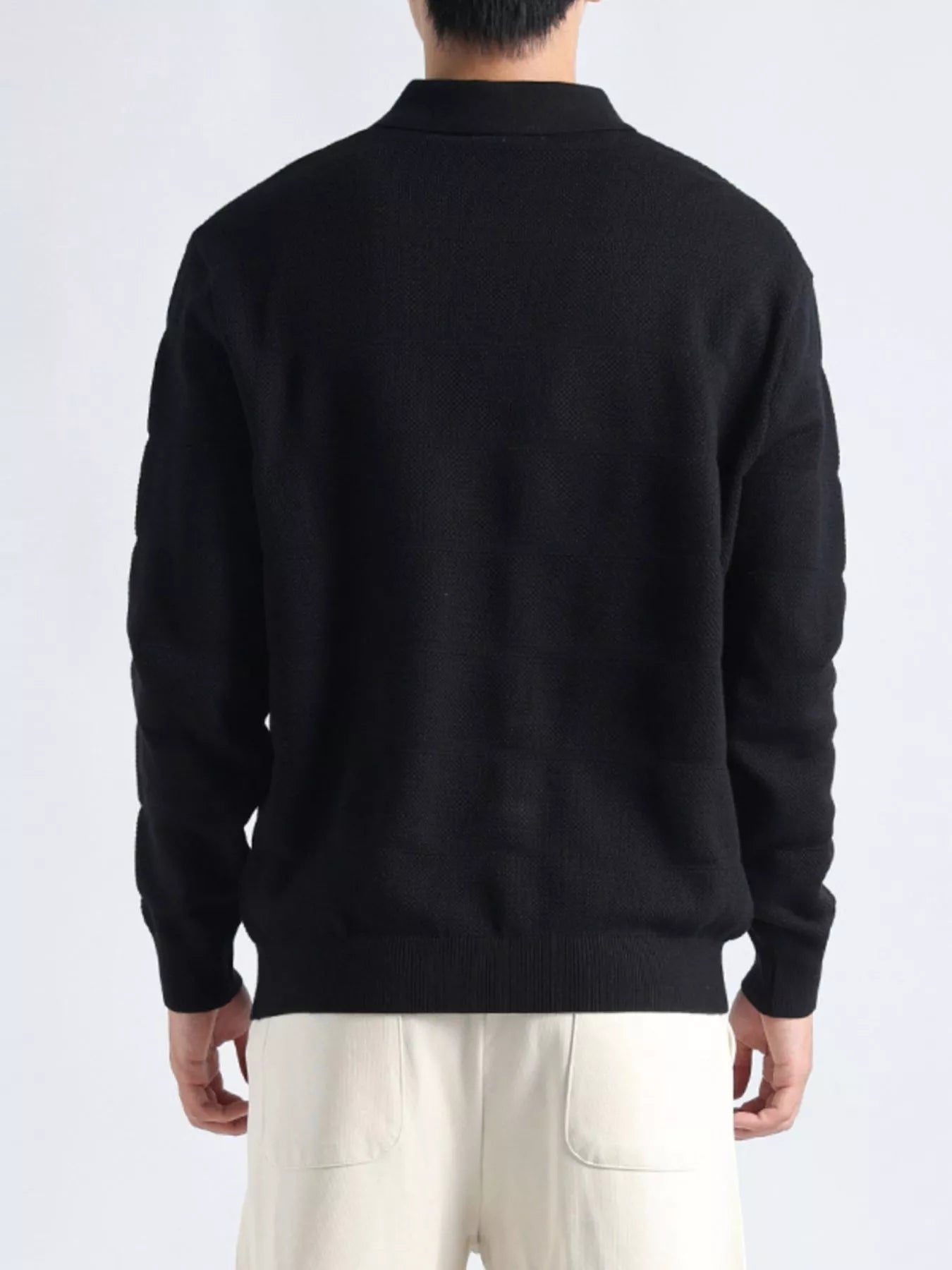 Plus size men's black long sleeve knit top with button details, featuring a stylish and comfortable design.