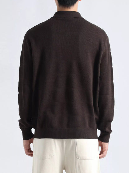 Plus size men's long sleeve knit top with button details, black color, from Trendsi, shown on a male model.