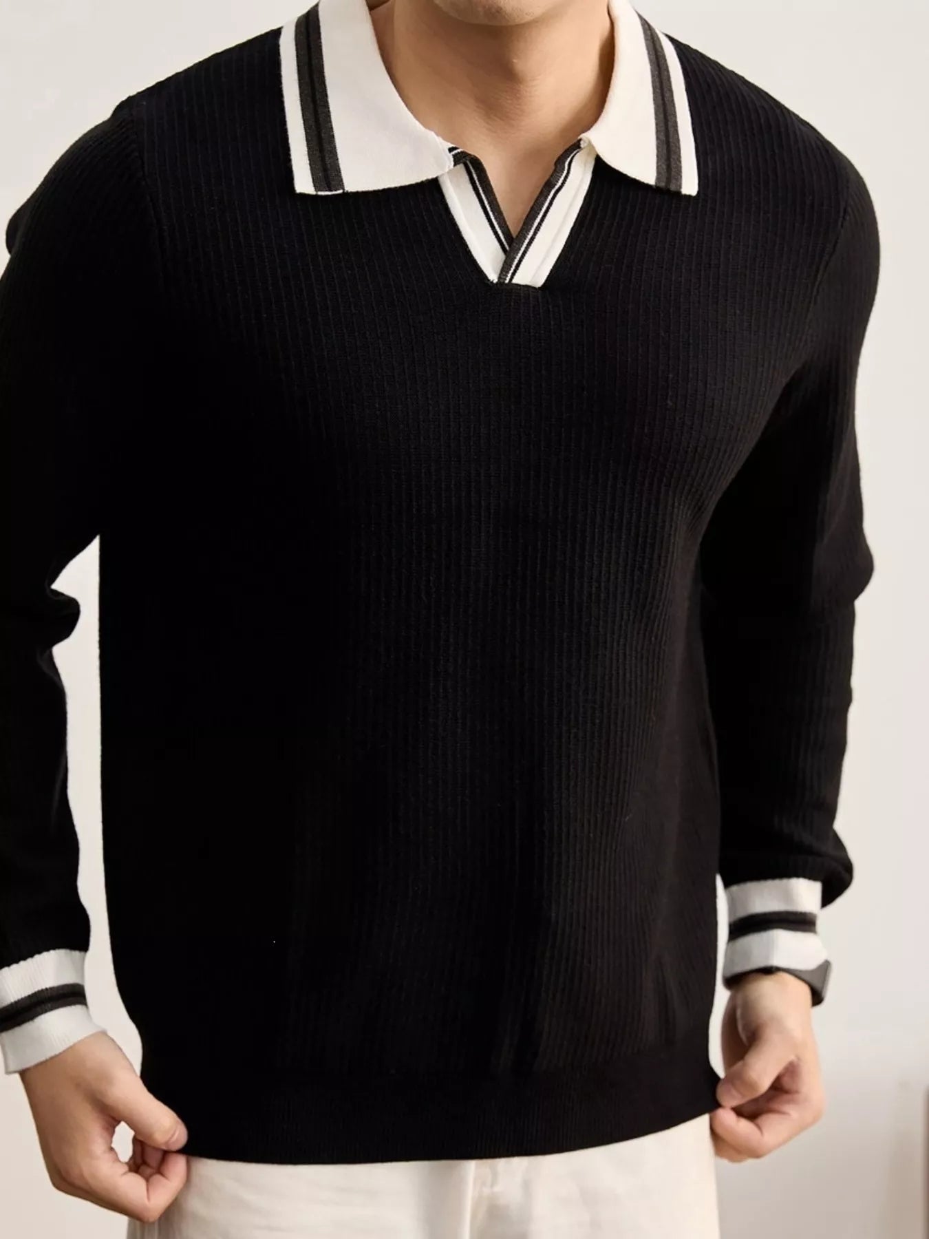 Men's plus size black polo collar ribbed knit sweater with contrast trim, by Trendsi, shown on a model.