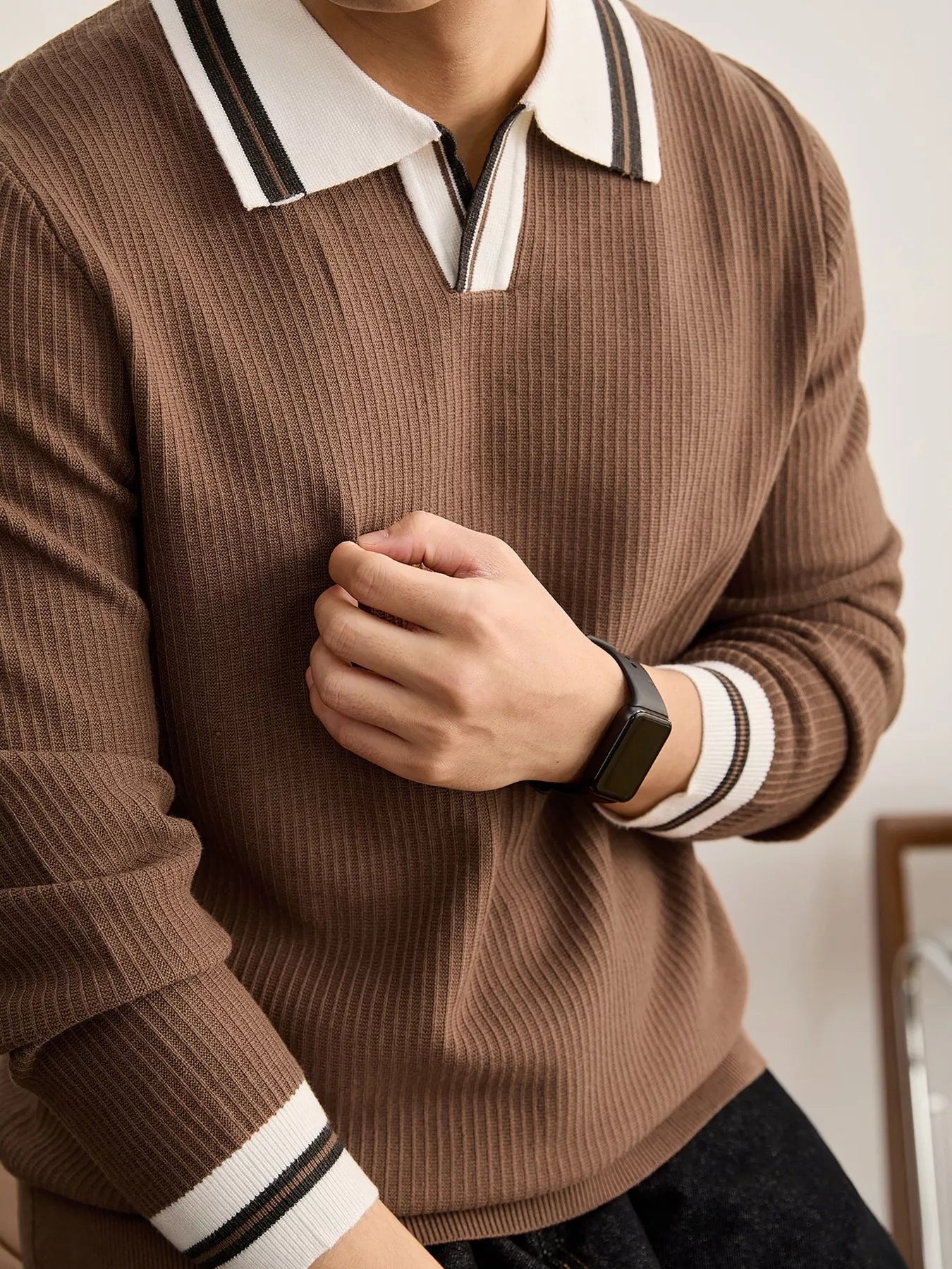 Men's plus size black ribbed knit sweater with contrast polo collar trim, by Trendsi, showcasing a comfortable, stylish fit.