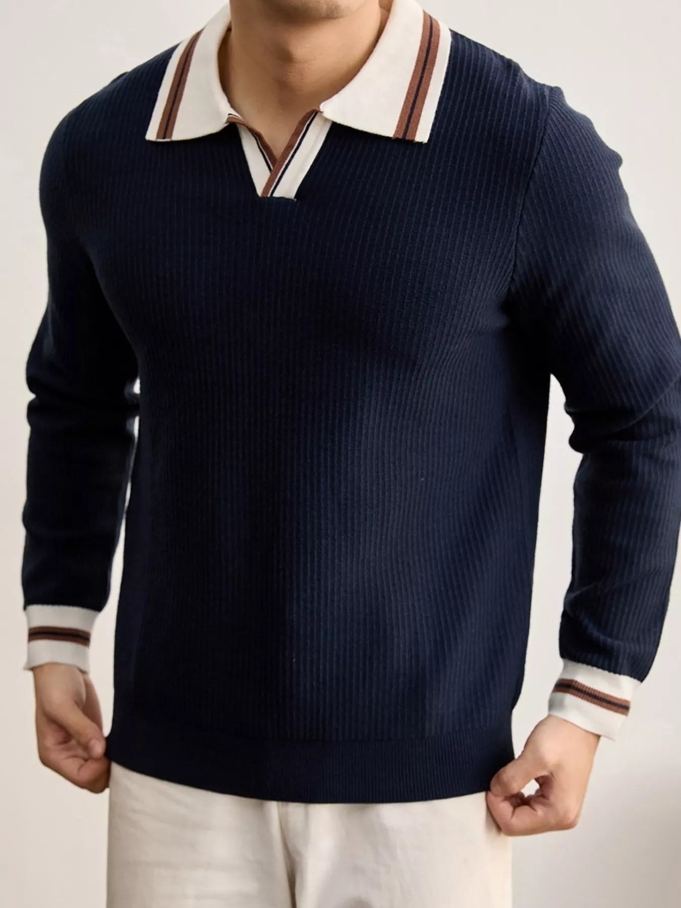 Men's plus size black ribbed knit sweater with contrast polo collar trim, designed by Trendsi.